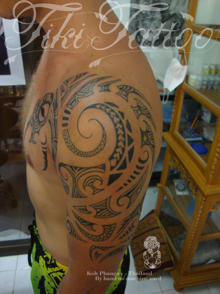 maori chest and sleeve - chest tattoo