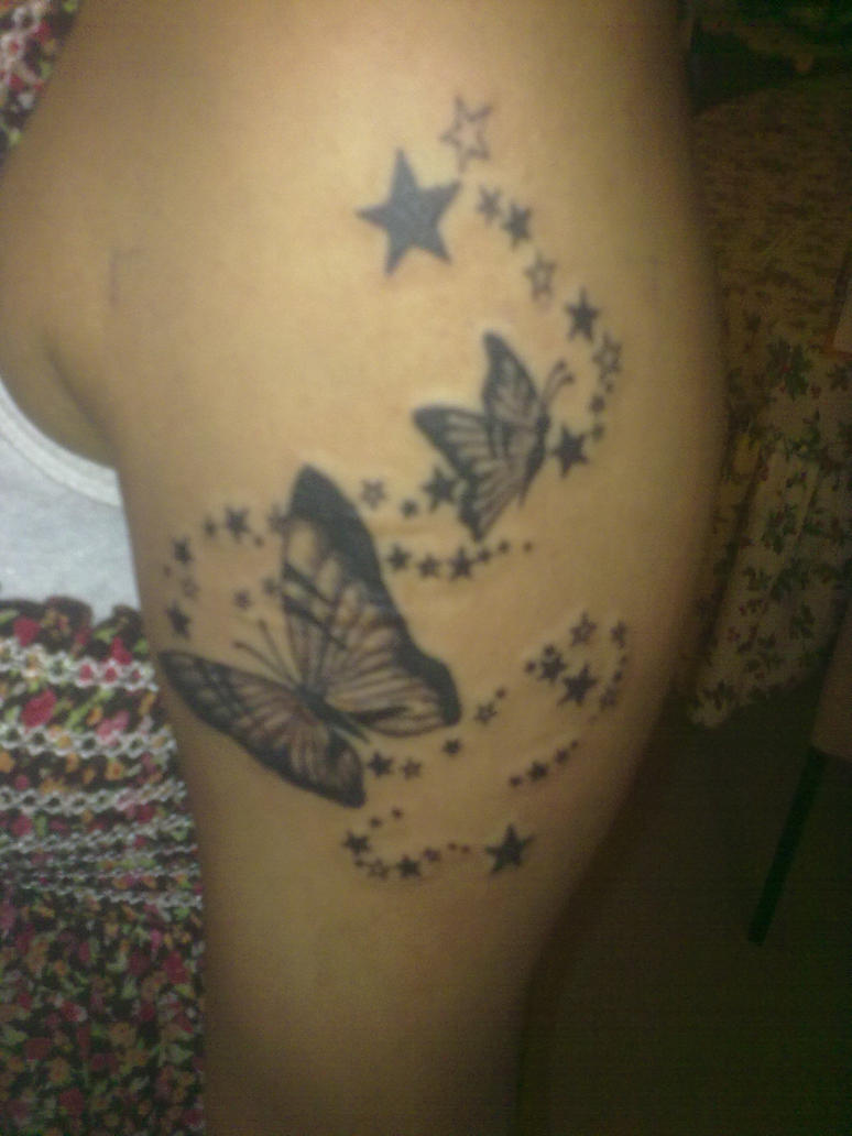 butterfly with stars tattoo